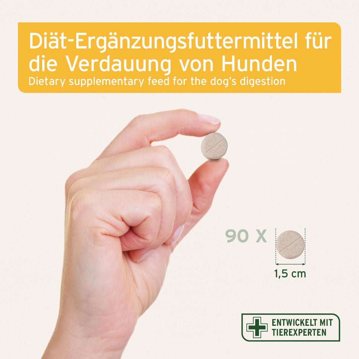 Diät-Ergänzungsfuttermittel für Hunde; eine Hand hält AniForte® plus Probiotikum Tablette, 90 Stück, 1,5 cm Größe.